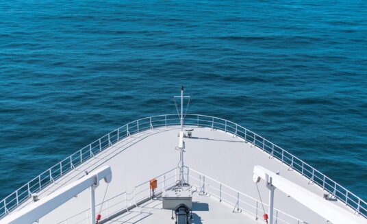 Cruise Ship Bow Closeup. Transatlantic Vessel on Route to Destination. Maritime Theme.