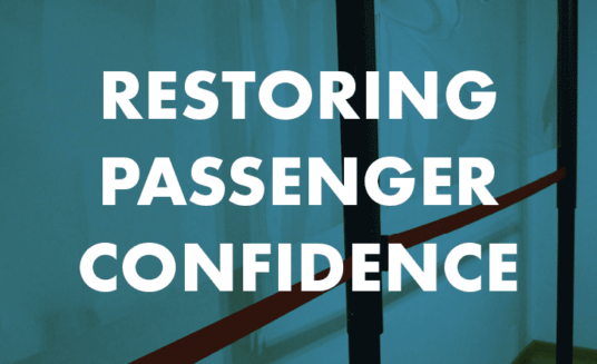 a blue filter over queue dividers on a cruise ship